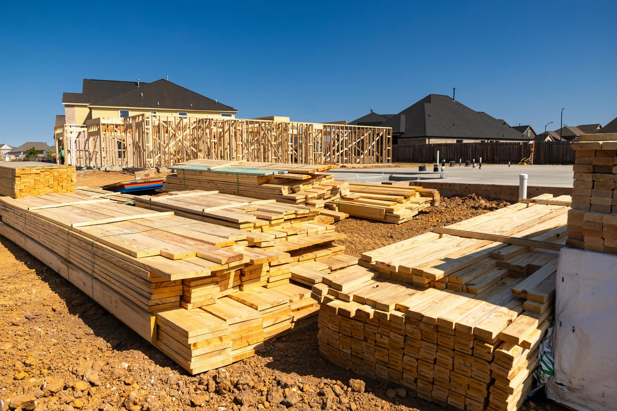 New construction framing representing development execution